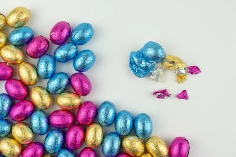 Group of easter eggs in blue, yellow and pink Stock Photos