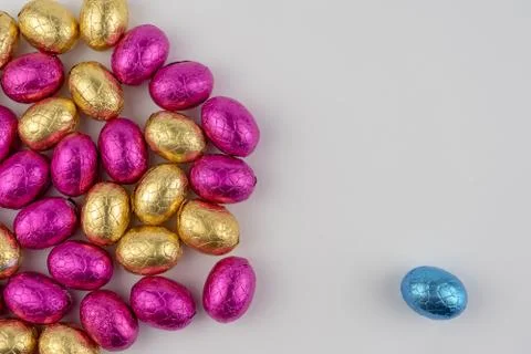 Group of easter eggs in blue, yellow and pink Stock Photos