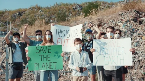 Group of ecological activists fighting for preservation of environment at huge Stock Footage 113926227