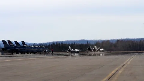 Group of Eight Fighter Jets About to Take Off Stock Footage 128553856