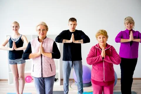 Group of elderly people doing exercises Stock Photos