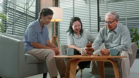 Group of elderly people enjoy talking , relaxing with game at  senior healt.. Stock Footage 226317156
