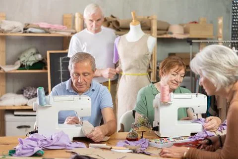 Group of elderly people at sewing master class 写真素材