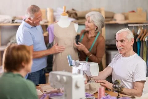 Group of elderly people at sewing master class 写真素材