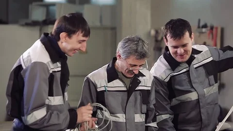 Group of electric workers at factory. Stock-Footage 77106102
