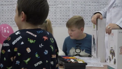 Group of elementary school children in classroom at lesson Stock Footage 82446841