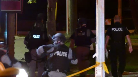 Group of the Emergency Task Force walking to a scene Video stock 57636193