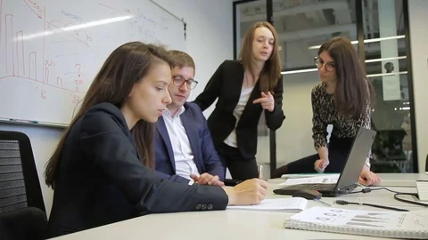 Group employees are talking while sitting in modern office. Video stock 83108861
