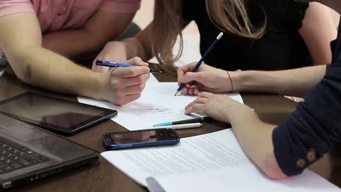 A group of employees work together on the project. Stock Footage 75817175