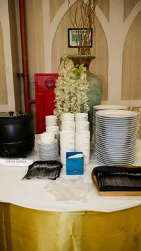 Group of empty dishware, Stacked on pile. Portrait View Stock Photos