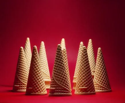 A group of  empty waffles cones on red background 库存照片