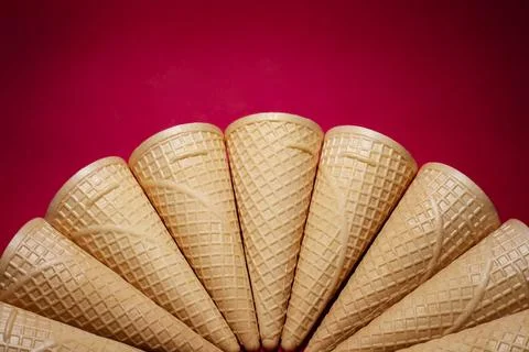 A group of  empty waffles cones on red background 库存照片