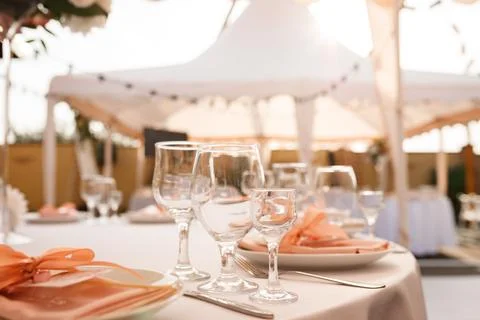 Group of empty wine glasses on the table Stock Photos
