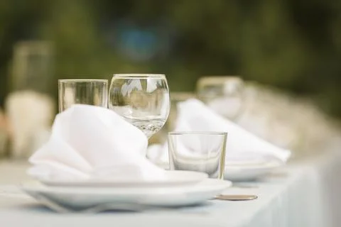 Group of empty wine glasses on the table Stock Photos