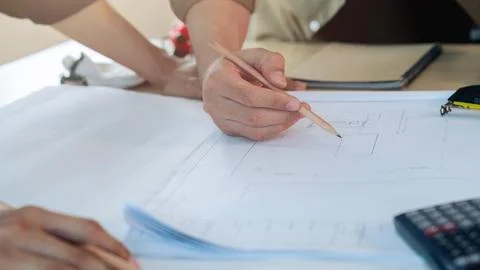 Group of engineer is discussion and brainstorming about condominium model of Stock Photos