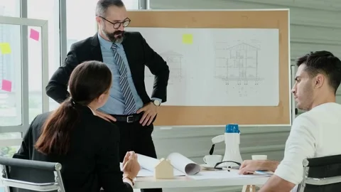 Group of Engineer, Technician, and Specialist meeting in the office. Brainsto Stock Footage 153650069