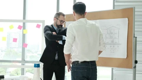 Group of Engineer, Technician, and Specialist Meeting In the office. Brainsto Stock Footage 153653597