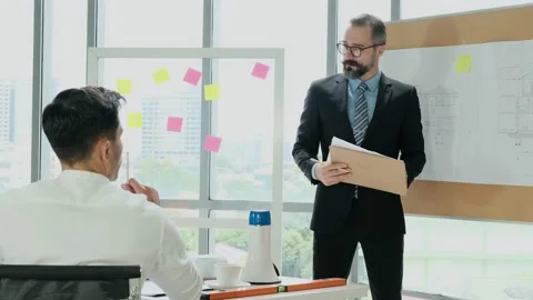 Group of Engineer, Technician, and Specialist Meeting In the office. Brainsto Stock Footage 153654912