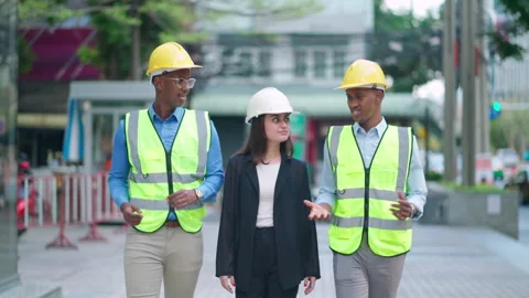 Group of engineer walking and discuss at the walkway Stock Footage 167840850