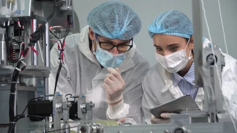 Group of engineer worker wearing ppe suite and face protective medical mask , Stock Footage 141408175