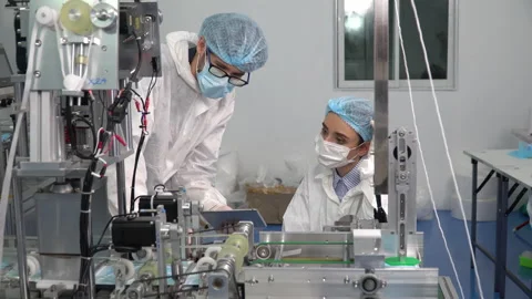 Group of engineer worker wearing ppe suite, face protective mask, glove usein Stock Footage 141408578