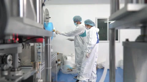 Group of engineer worker wearing ppe suite, face protective mask, glove usein Stock Footage 141408593