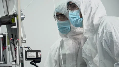 Group of engineer worker wearing ppe suite, face protective mask and glove di Stock Footage 141409897