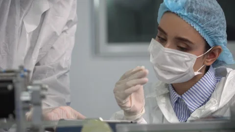 Group of engineer worker wearing ppe suite and face protective medical mask , Stock Footage 146819704