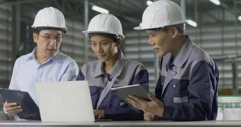Group of engineer working at factory. They looking to laptop to work together. Stock-Footage 166076147