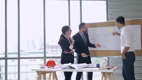 Group engineering with manager in project meeting  Stock-Footage 139248464