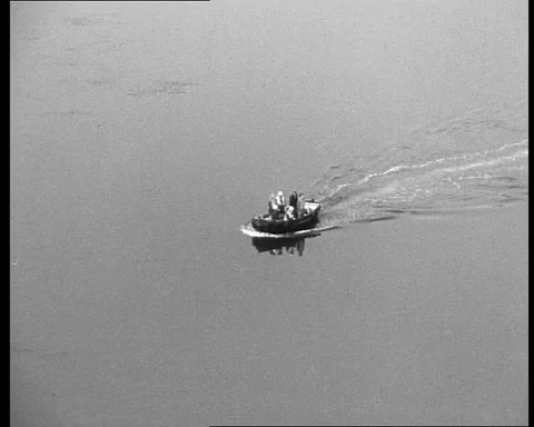 Group of engineers discuss bridge building plans on river boat, UK 1973 Stock Footage 132324462