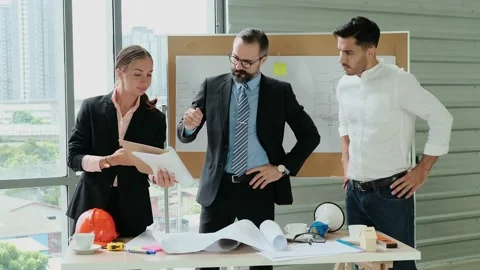 Group of Engineers, Technicians, and Specialists  Meeting In the office. Brai Stock Footage 153645376