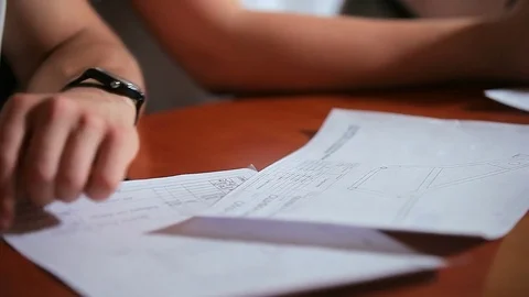 Group of engineers work on drawings Video stock 83334494