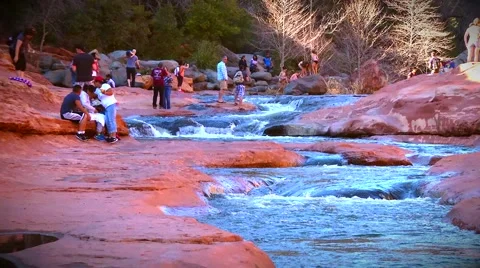 Group enjoys Slide Rock Stock Footage 60796981