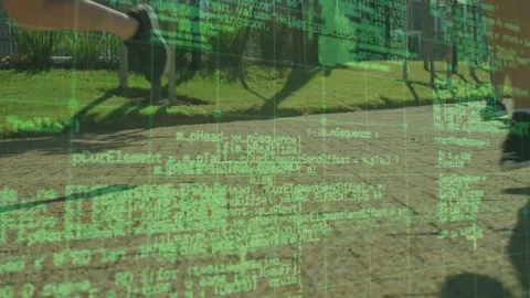 Group entering frame, camera tracking footfalls, green code overlay highlighting Vídeos de archivo 330917481