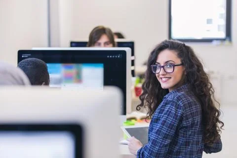 Group of entrepreneurs working using a computer Stock Photos