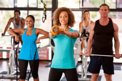 Group exercising in a gym Stock Photos
