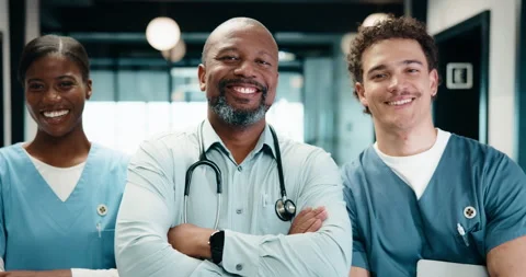 Group, face and doctors with arms crossed in hospital, healthcare and confident Stock Footage 335437085