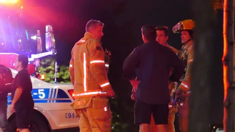 Group of firefighters debriefing Stock Footage 119903540