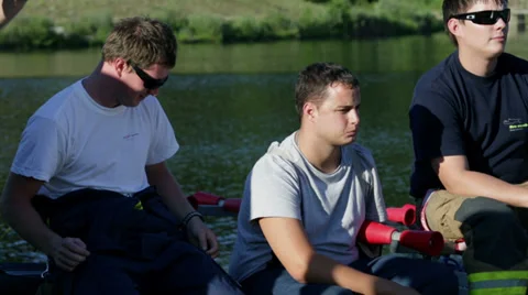 Group of fireman sitting and talking Stock Footage 33037159