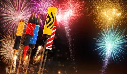 Group of fireworks rockets launching into the sky Stock Photos