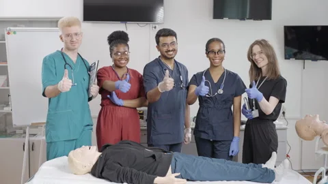 Group of first aid doctors showing thumbs up in medical clinic Stock-Footage 272223067