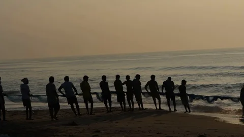 Group of fisher man pulling net to catch fishes Stock Footage 98289999