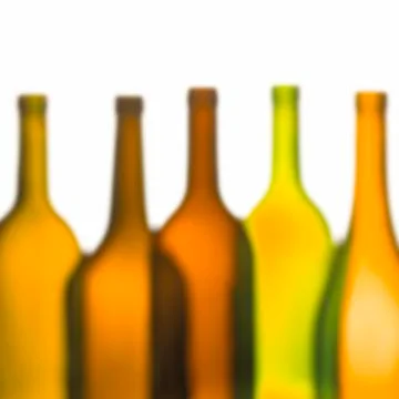GROUP OF FIVE EMPTY WINE BOTTLES Stock Photos