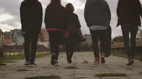 Group of Five Happy Teenagers Walking Forward Outwards Camera Stock Footage