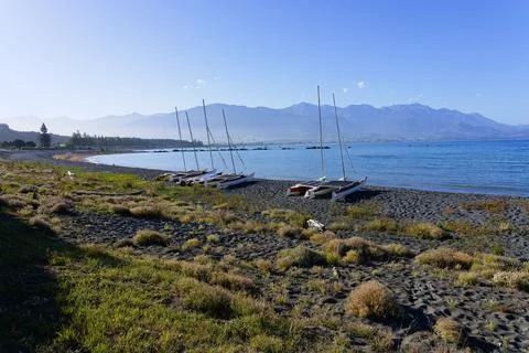 Group of five small catamarans high on Kaikoura beach Stock Photos