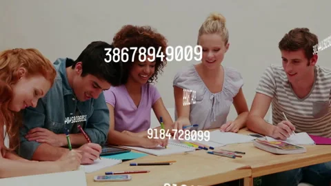 Group of five students collaborating at table sharing pencil and smiling as code Stock Footage 312279781