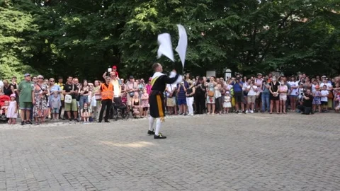 A group of flag throwers making a performance on the square. Видео 157550395