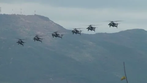 Group flight of combat helicopters Mi-28N (Havoc) over waters of Gelendzhik Bay. Stock Footage 132106907
