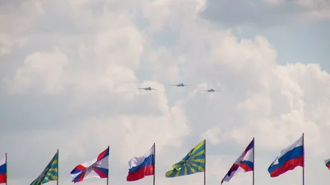 Group flight of three Tupolev Tu-160 (Blackjack) strategic bomber-missile. Stock Footage 118959839